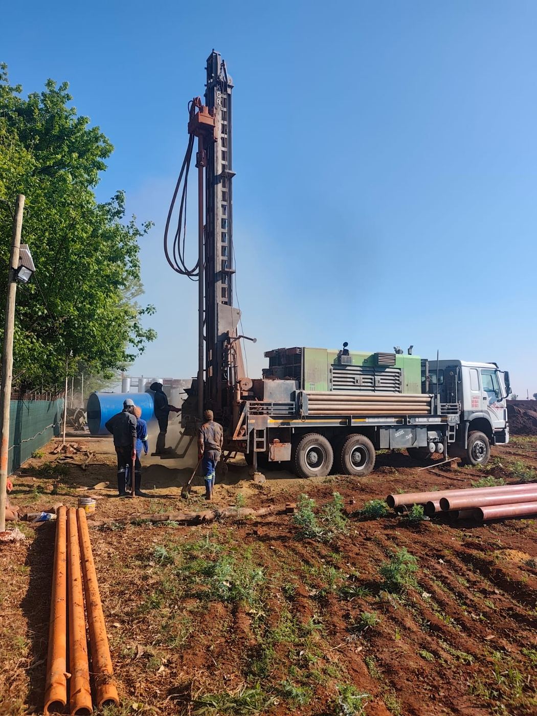 Drilling truck with pipes laid out